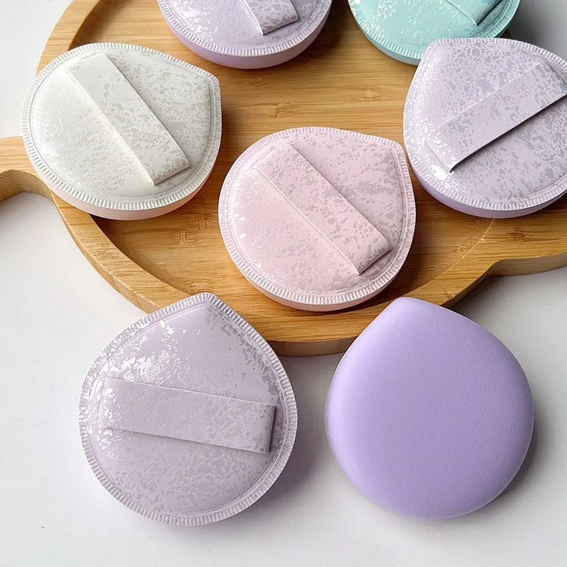 Round and triangular powder puffs